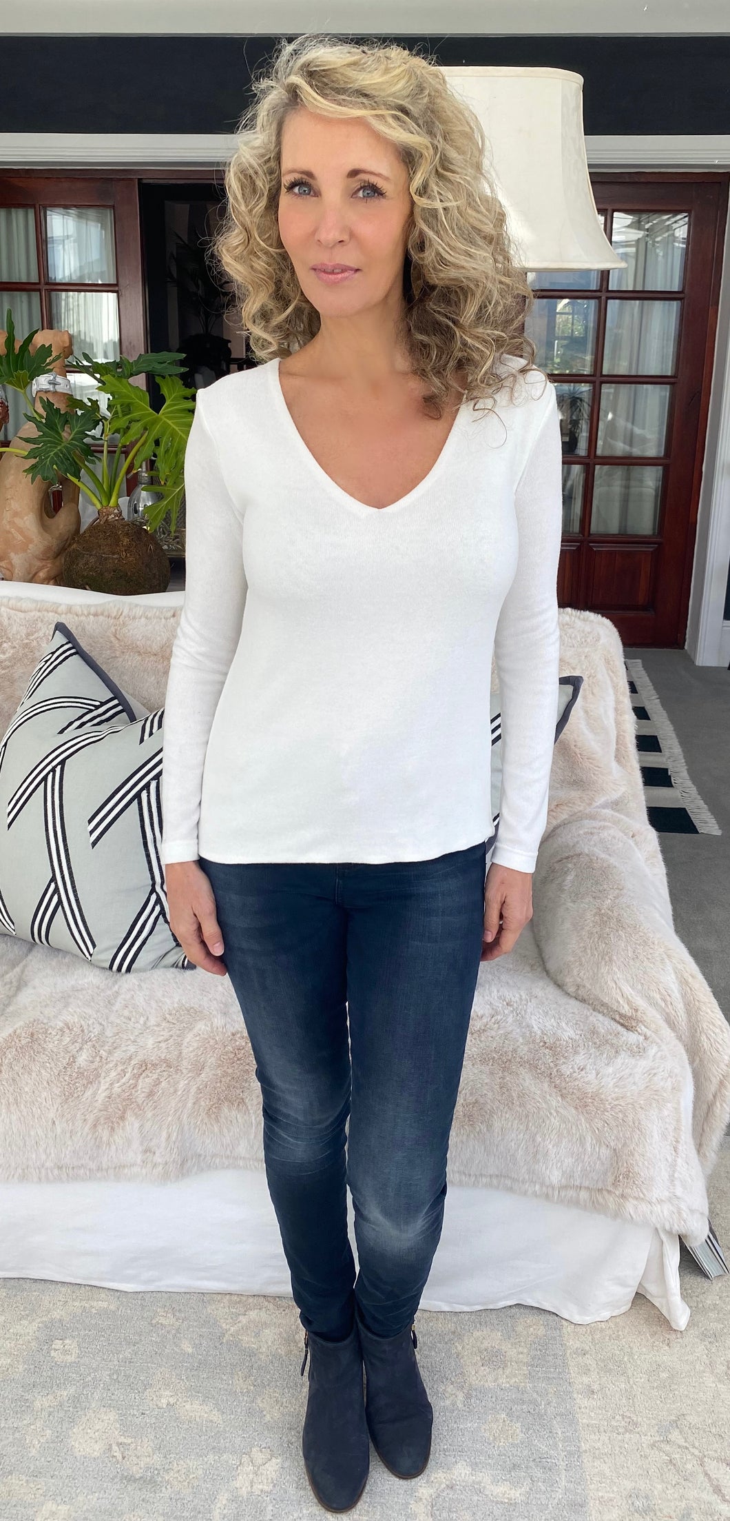 Zizi's winter white v-neck top