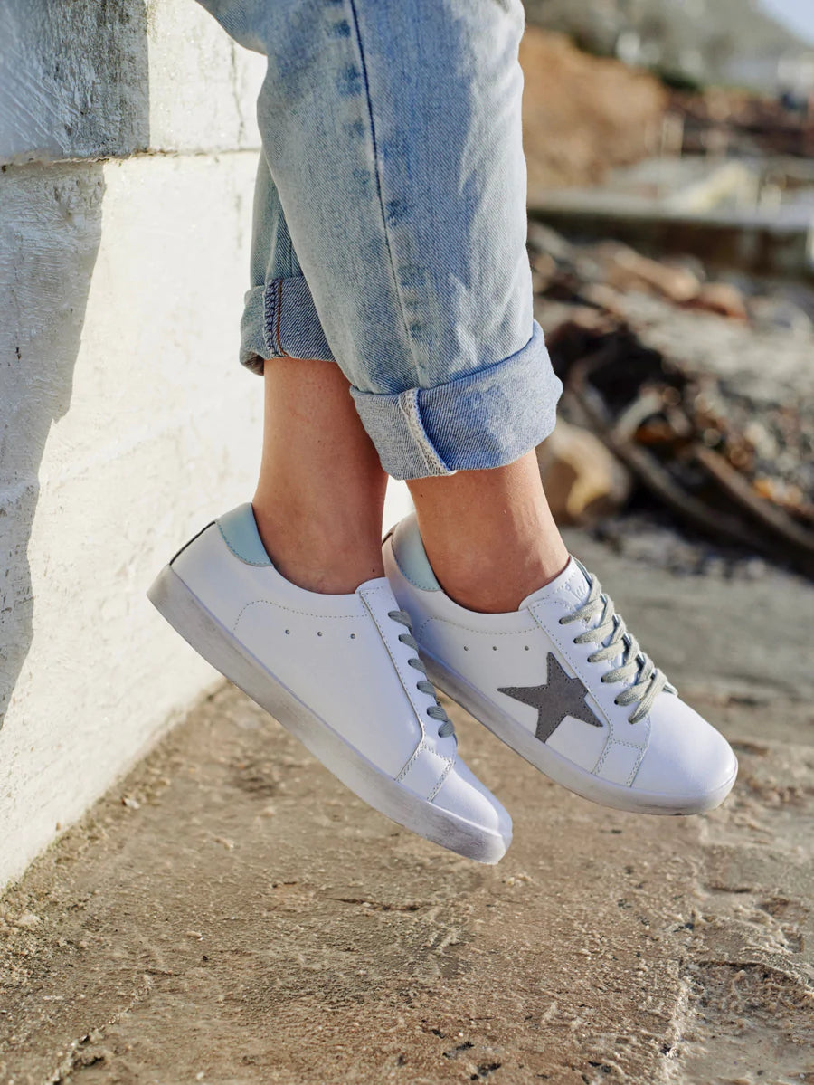 White and grey star sneakers